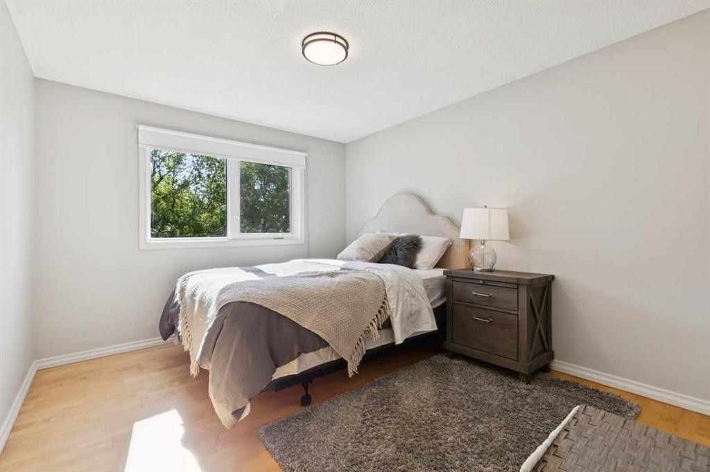 16 Brenner Place Nw, Calgary, AB - Indoor Photo Showing Bedroom