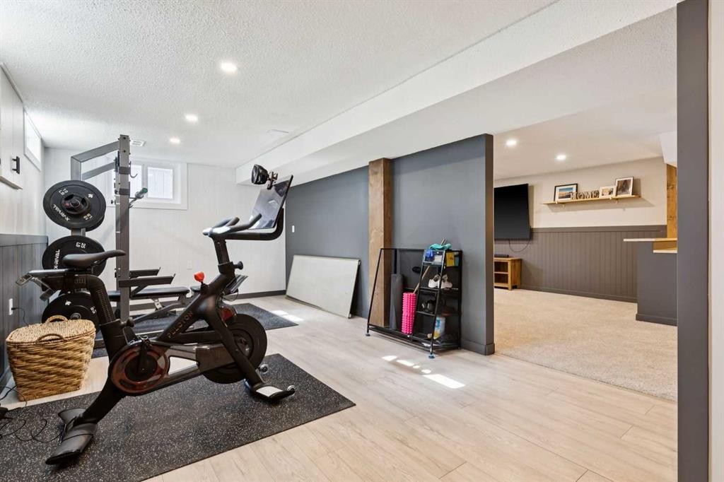 16 Brenner Place Nw, Calgary, AB - Indoor Photo Showing Gym Room