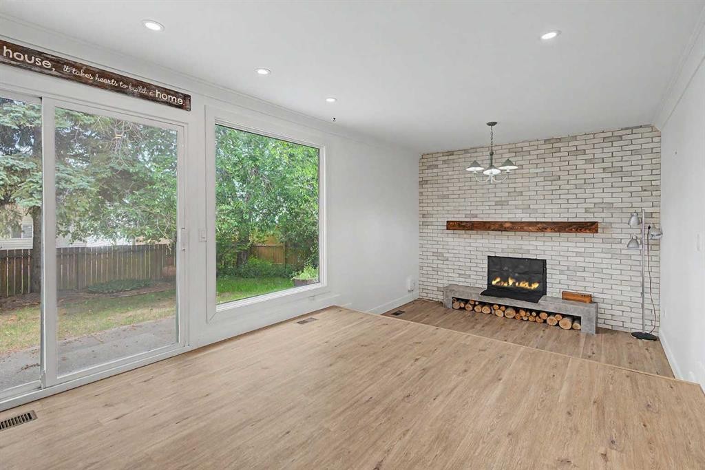 1320 116 Avenue Sw, Calgary, AB - Indoor With Fireplace