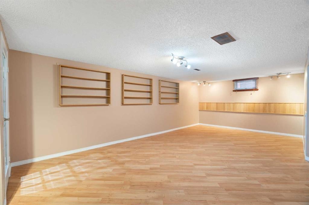 48 Deermont Way Se, Calgary, AB - Indoor Photo Showing Other Room