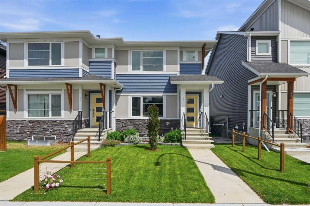 52 Emberside Grove, Cochrane, AB - Outdoor With Facade
