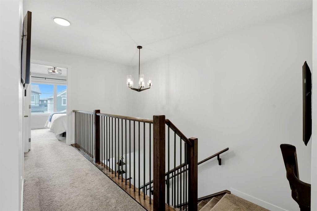 52 Emberside Grove, Cochrane, AB - Indoor Photo Showing Other Room