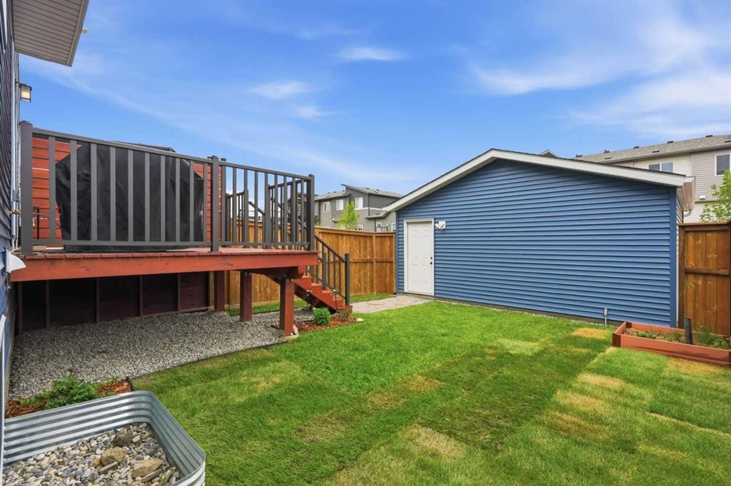 52 Emberside Grove, Cochrane, AB - Outdoor With Deck Patio Veranda With Exterior