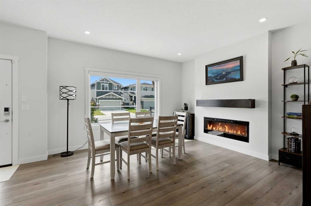 52 Emberside Grove, Cochrane, AB - Indoor With Fireplace
