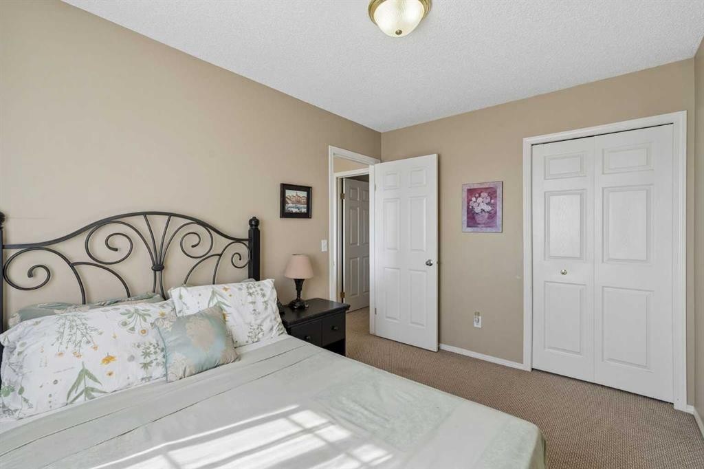 100 Applemont Close Se, Calgary, AB - Indoor Photo Showing Bedroom