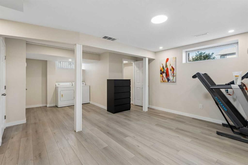 100 Applemont Close Se, Calgary, AB - Indoor Photo Showing Gym Room