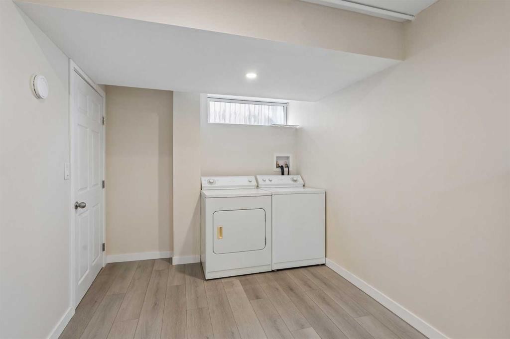 100 Applemont Close Se, Calgary, AB - Indoor Photo Showing Laundry Room