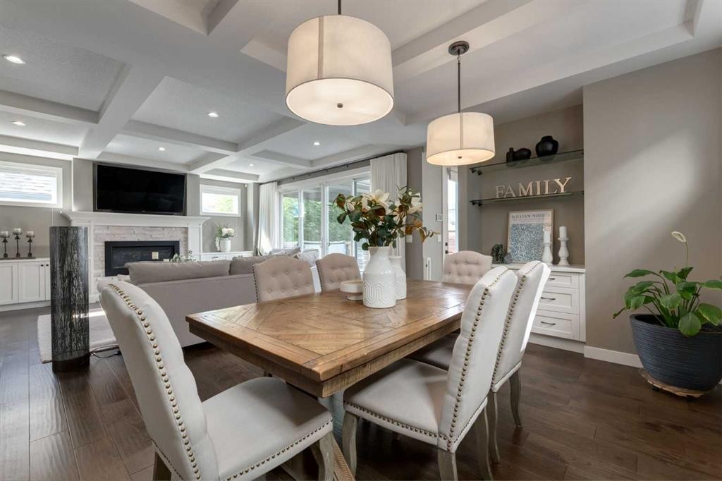 428 21 Avenue Ne, Calgary, AB - Indoor Photo Showing Dining Room With Fireplace