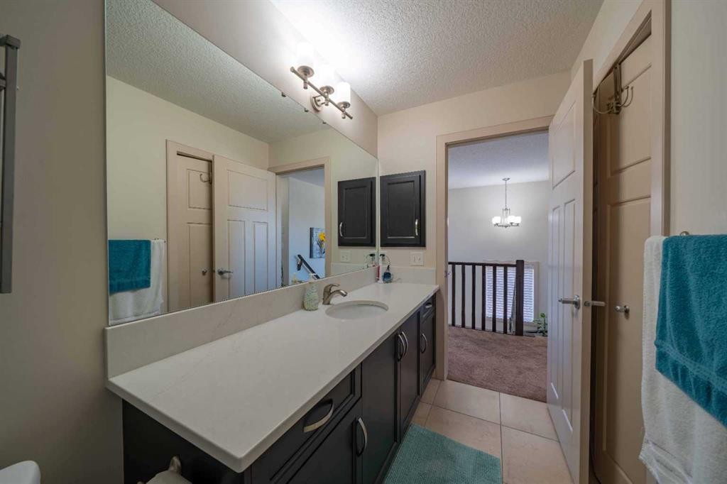 144 Everhollow Street Sw, Calgary, AB - Indoor Photo Showing Bathroom