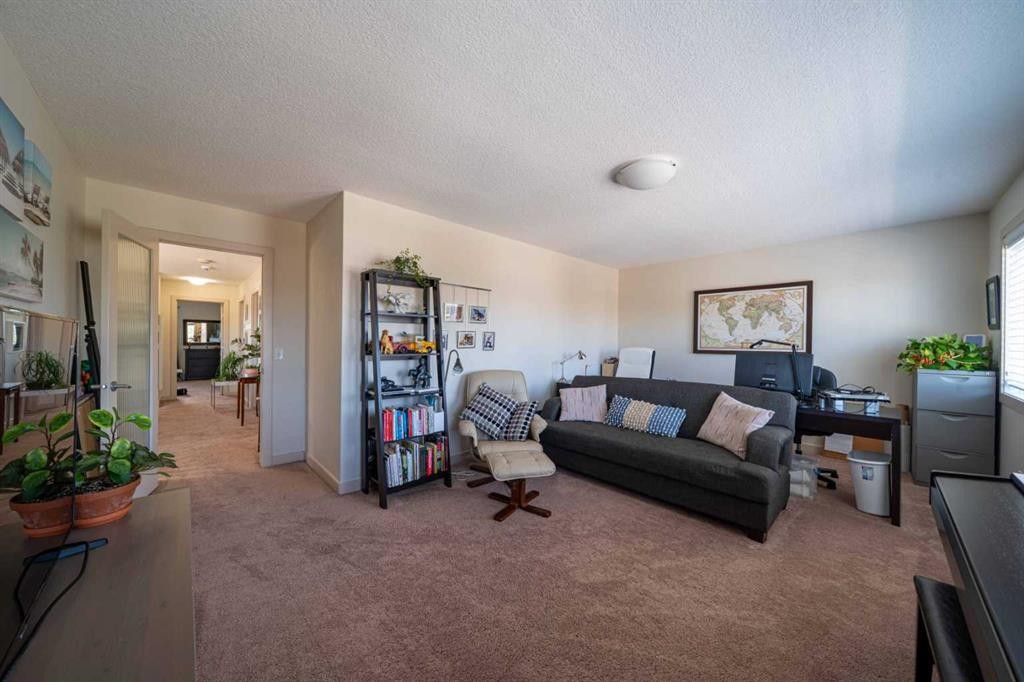 144 Everhollow Street Sw, Calgary, AB - Indoor Photo Showing Other Room