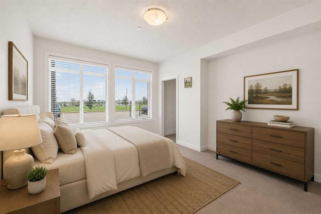 113-1005A Westmount Drive, Strathmore, AB - Indoor Photo Showing Bedroom