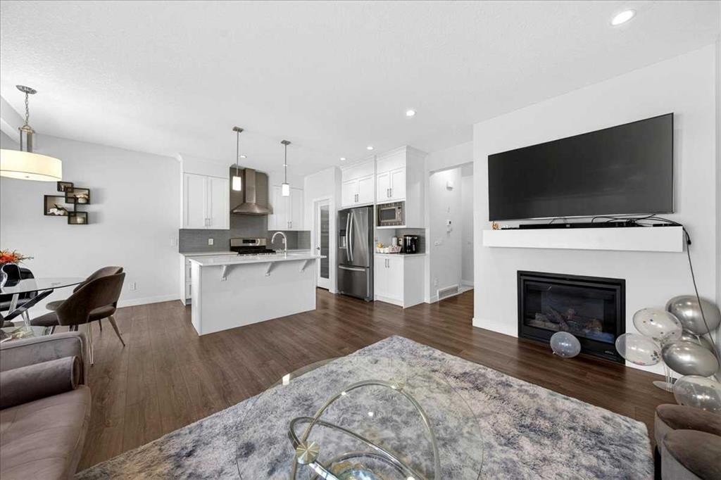 44 Saddlestone Way Ne, Calgary, AB - Indoor Photo Showing Other Room With Fireplace