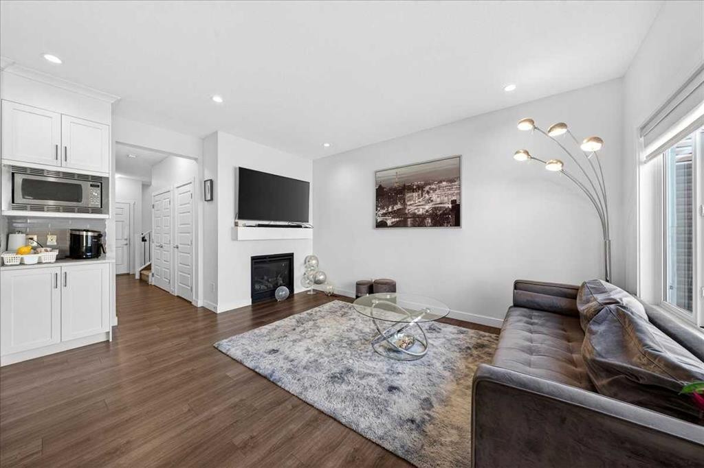 44 Saddlestone Way Ne, Calgary, AB - Indoor With Fireplace