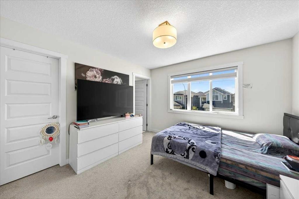 44 Saddlestone Way Ne, Calgary, AB - Indoor Photo Showing Bedroom