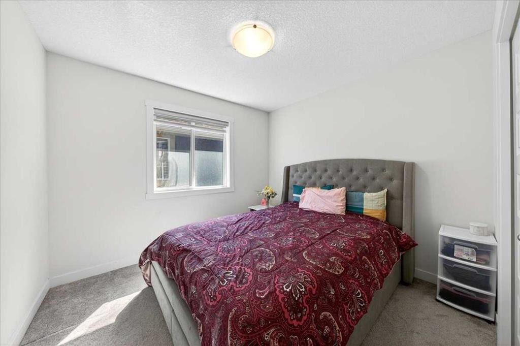 44 Saddlestone Way Ne, Calgary, AB - Indoor Photo Showing Bedroom