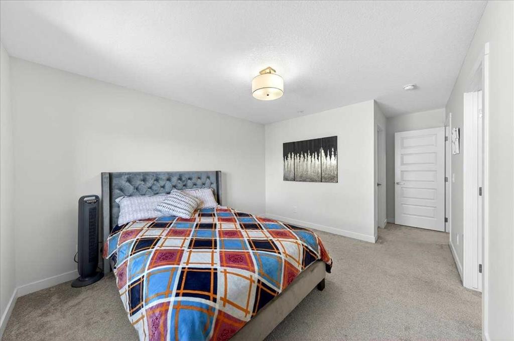 44 Saddlestone Way Ne, Calgary, AB - Indoor Photo Showing Bedroom