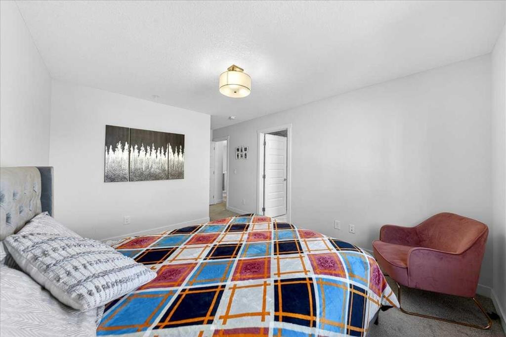 44 Saddlestone Way Ne, Calgary, AB - Indoor Photo Showing Bedroom