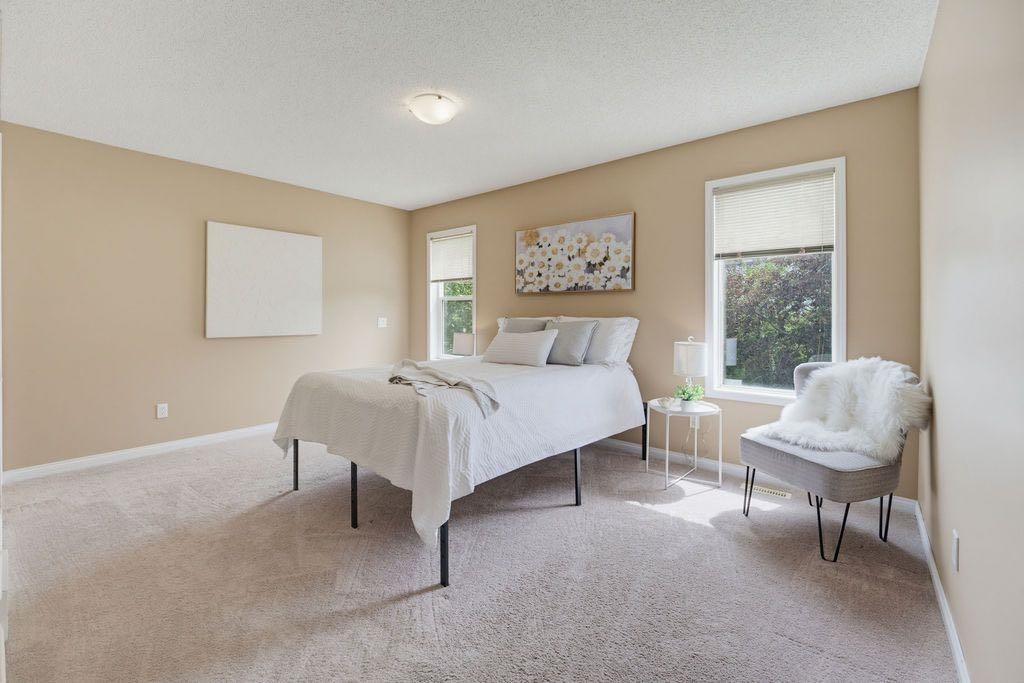 359 Hidden Ranch Place Nw, Calgary, AB - Indoor Photo Showing Bedroom