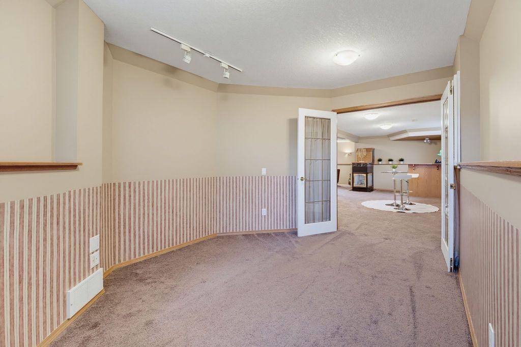 359 Hidden Ranch Place Nw, Calgary, AB - Indoor Photo Showing Other Room