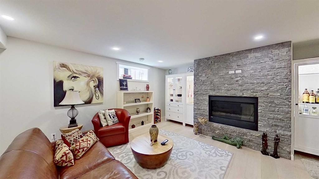 7 Bridlecrest Boulevard Sw, Calgary, AB - Indoor Photo Showing Living Room With Fireplace