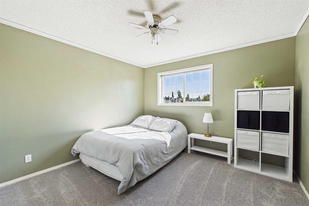 70 Coventry Crescent Ne, Calgary, AB - Indoor Photo Showing Bedroom