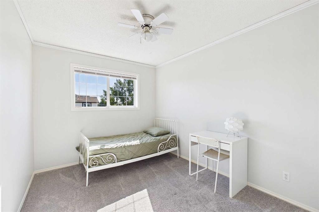 70 Coventry Crescent Ne, Calgary, AB - Indoor Photo Showing Bedroom