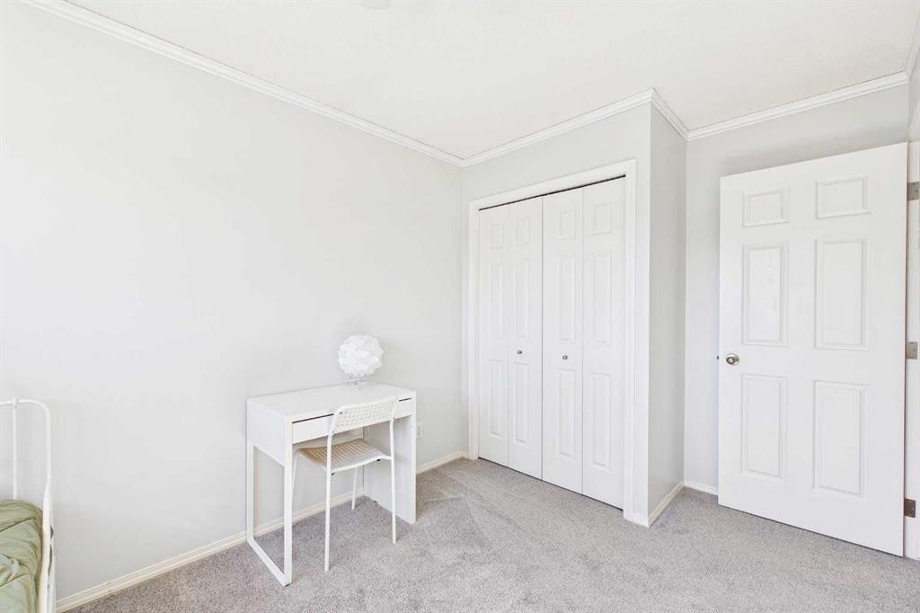 70 Coventry Crescent Ne, Calgary, AB - Indoor Photo Showing Bedroom