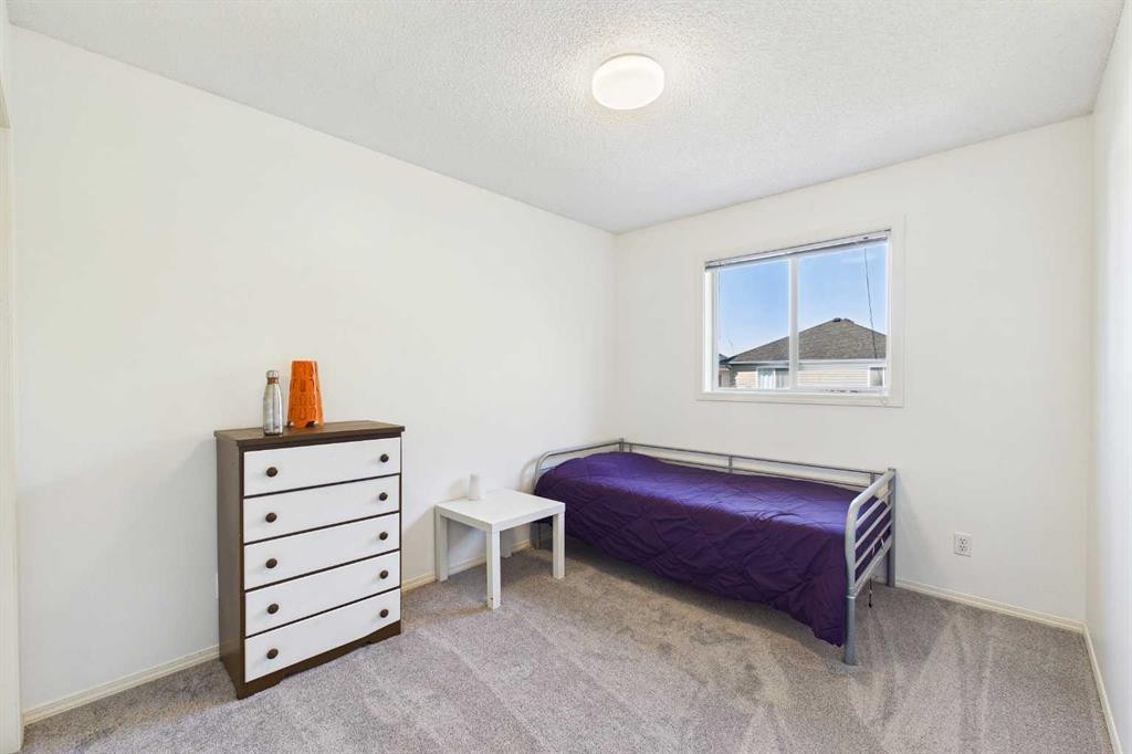 70 Coventry Crescent Ne, Calgary, AB - Indoor Photo Showing Bedroom