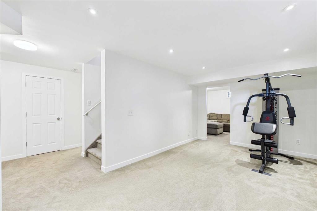 70 Coventry Crescent Ne, Calgary, AB - Indoor Photo Showing Gym Room