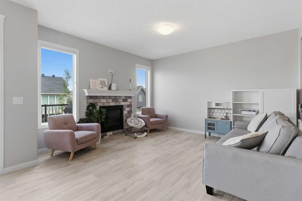 283 Nolanhurst Crescent Nw, Calgary, AB - Indoor Photo Showing Living Room With Fireplace