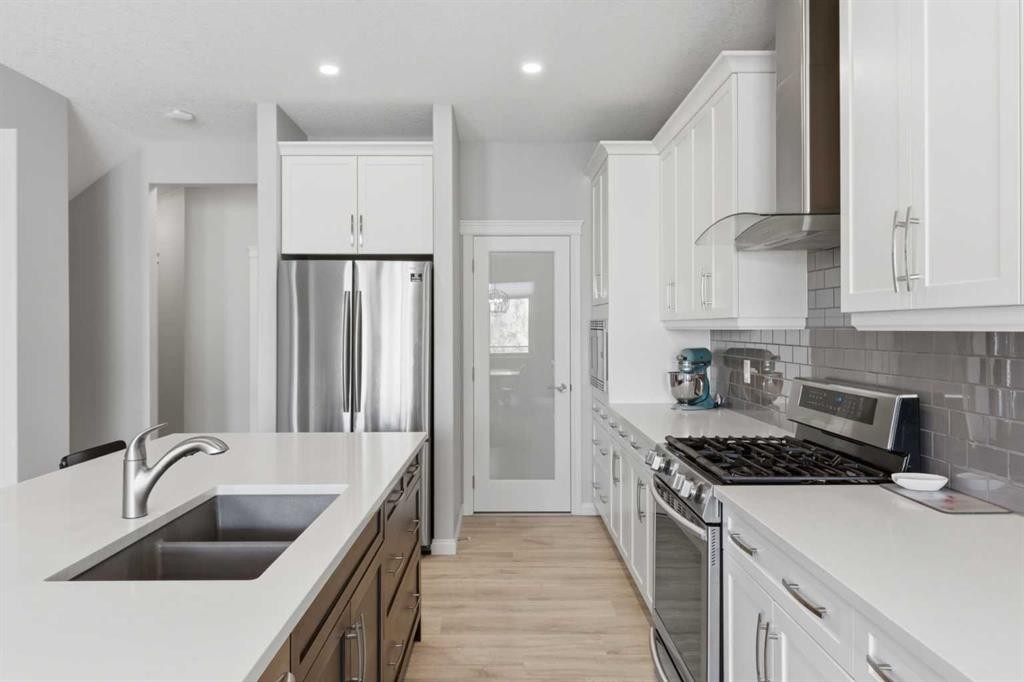 283 Nolanhurst Crescent Nw, Calgary, AB - Indoor Photo Showing Kitchen With Stainless Steel Kitchen With Double Sink With Upgraded Kitchen