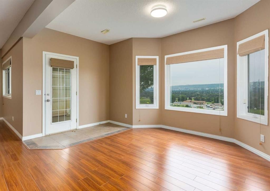 115 Scimitar Heath Nw, Calgary, AB - Indoor Photo Showing Other Room