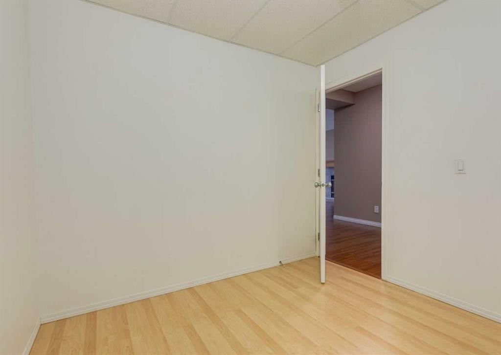 115 Scimitar Heath Nw, Calgary, AB - Indoor Photo Showing Other Room