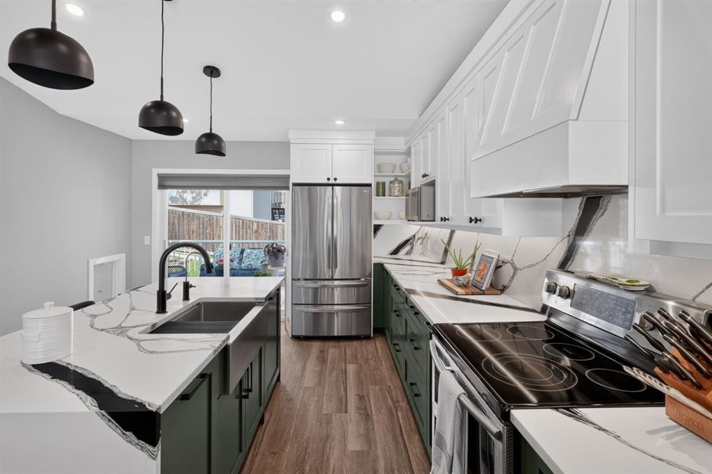 107 Edgevalley Close Nw, Calgary, AB - Indoor Photo Showing Kitchen With Double Sink With Upgraded Kitchen