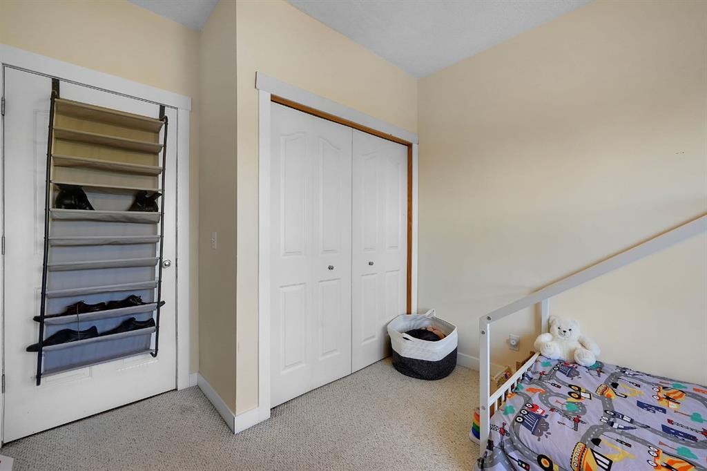 227-1920 14 Avenue Ne, Calgary, AB - Indoor Photo Showing Bedroom
