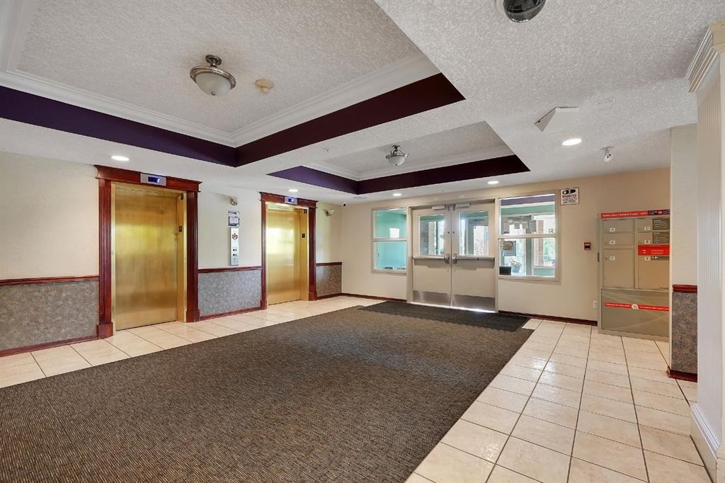 227-1920 14 Avenue Ne, Calgary, AB - Indoor Photo Showing Other Room