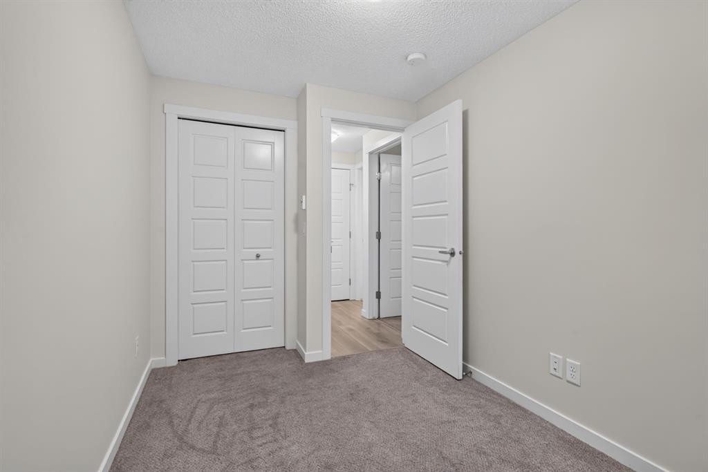 461 Cranbrook Square Se, Calgary, AB - Indoor Photo Showing Other Room