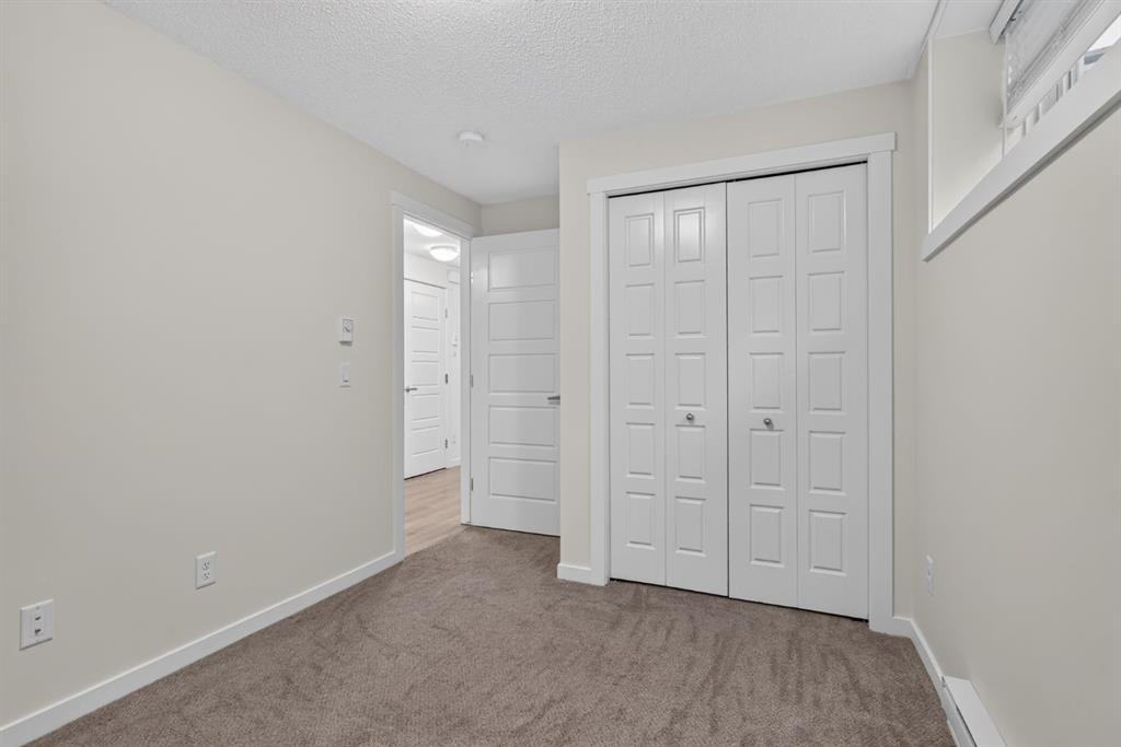 461 Cranbrook Square Se, Calgary, AB - Indoor Photo Showing Other Room
