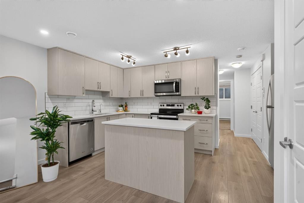 461 Cranbrook Square Se, Calgary, AB - Indoor Photo Showing Kitchen With Upgraded Kitchen