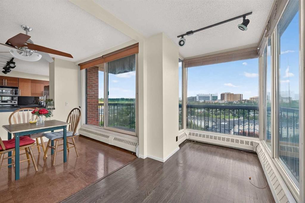 1607-145 Point Drive Nw, Calgary, AB - Indoor Photo Showing Living Room