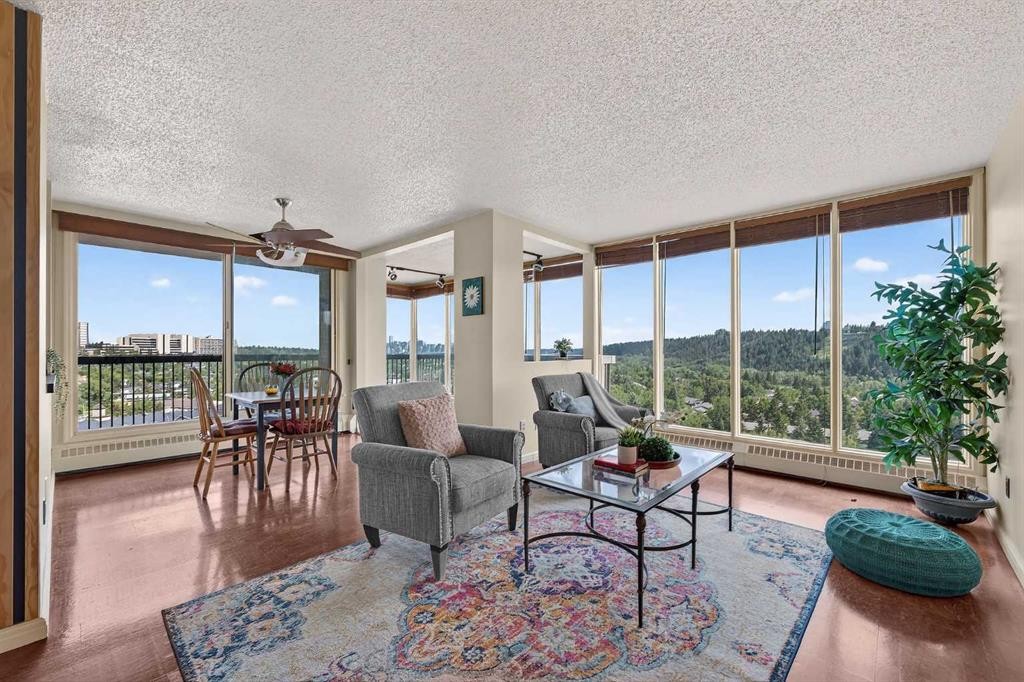 1607-145 Point Drive Nw, Calgary, AB - Indoor Photo Showing Living Room