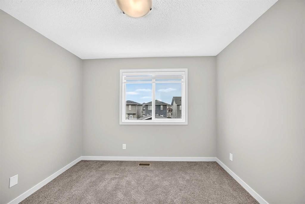 716-32 Red Embers Parade Ne, Calgary, AB - Indoor Photo Showing Other Room