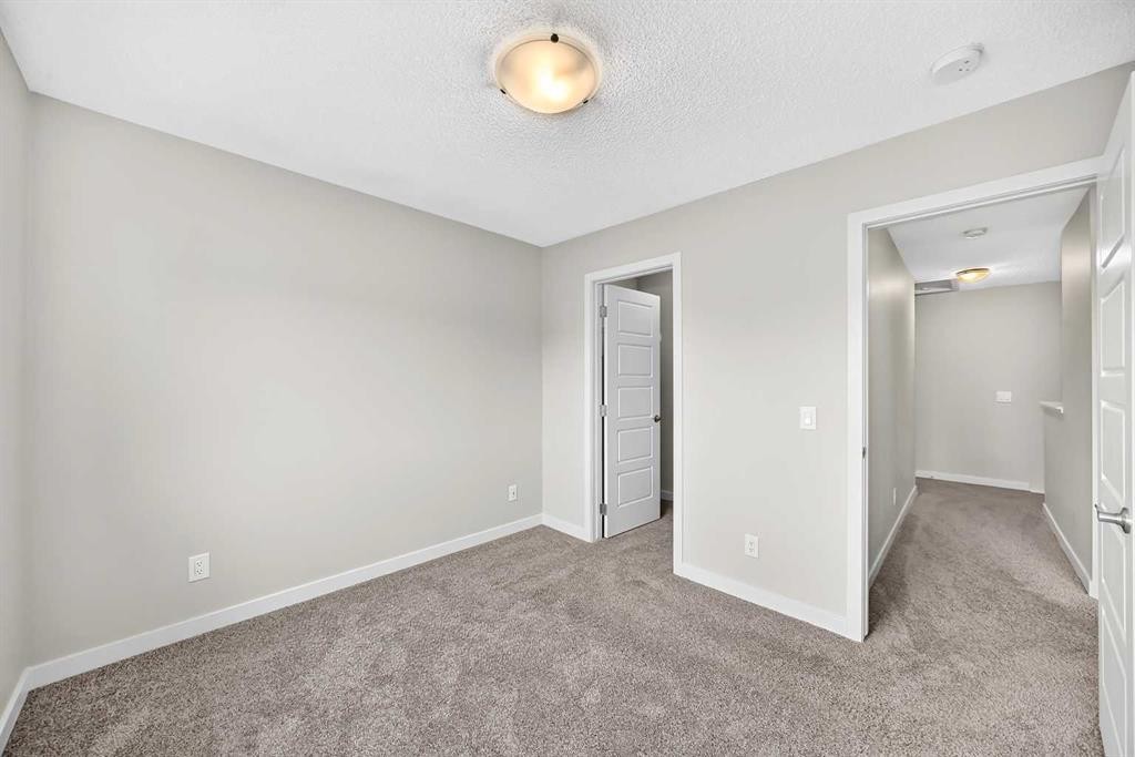716-32 Red Embers Parade Ne, Calgary, AB - Indoor Photo Showing Other Room