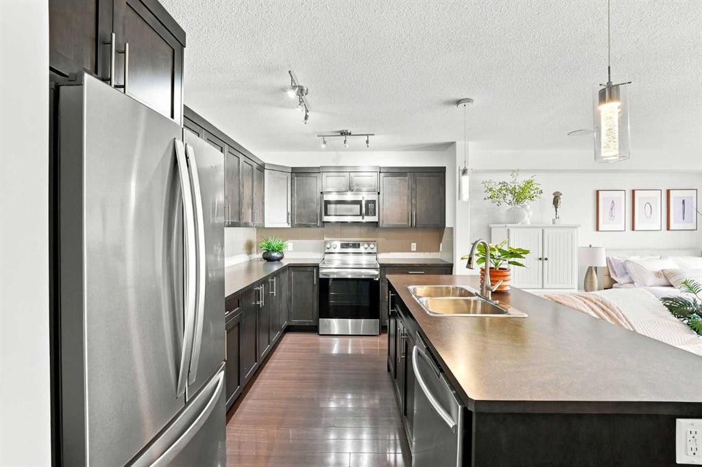 308 Redstone View Ne, Calgary, AB - Indoor Photo Showing Kitchen With Stainless Steel Kitchen With Double Sink With Upgraded Kitchen