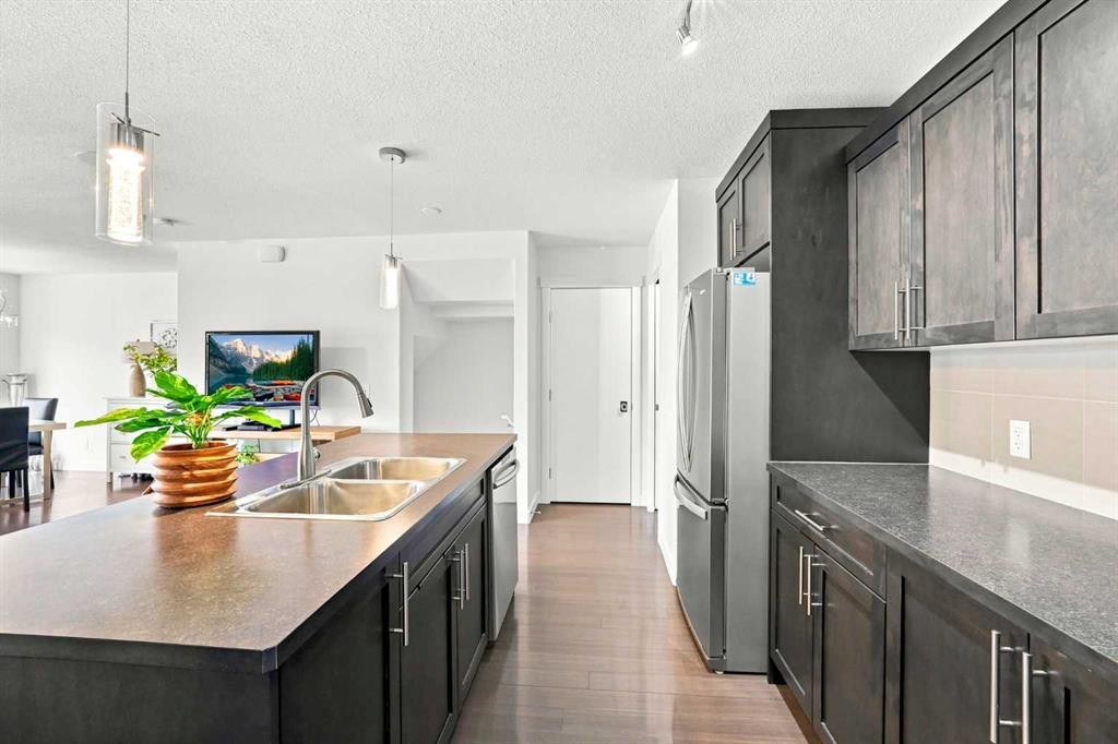 308 Redstone View Ne, Calgary, AB - Indoor Photo Showing Kitchen With Stainless Steel Kitchen With Double Sink With Upgraded Kitchen