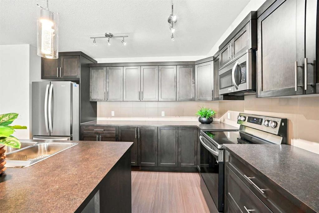 308 Redstone View Ne, Calgary, AB - Indoor Photo Showing Kitchen With Stainless Steel Kitchen With Double Sink With Upgraded Kitchen
