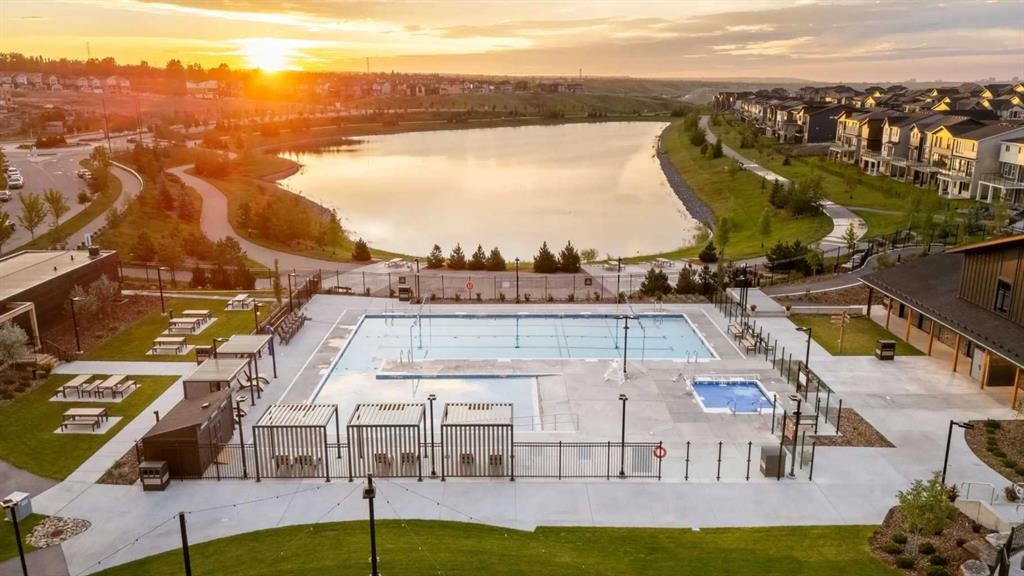 302-260 Rowley Way Nw, Calgary, AB - Outdoor With In Ground Pool With View