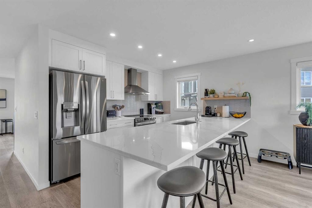 302-260 Rowley Way Nw, Calgary, AB - Indoor Photo Showing Kitchen With Stainless Steel Kitchen With Upgraded Kitchen