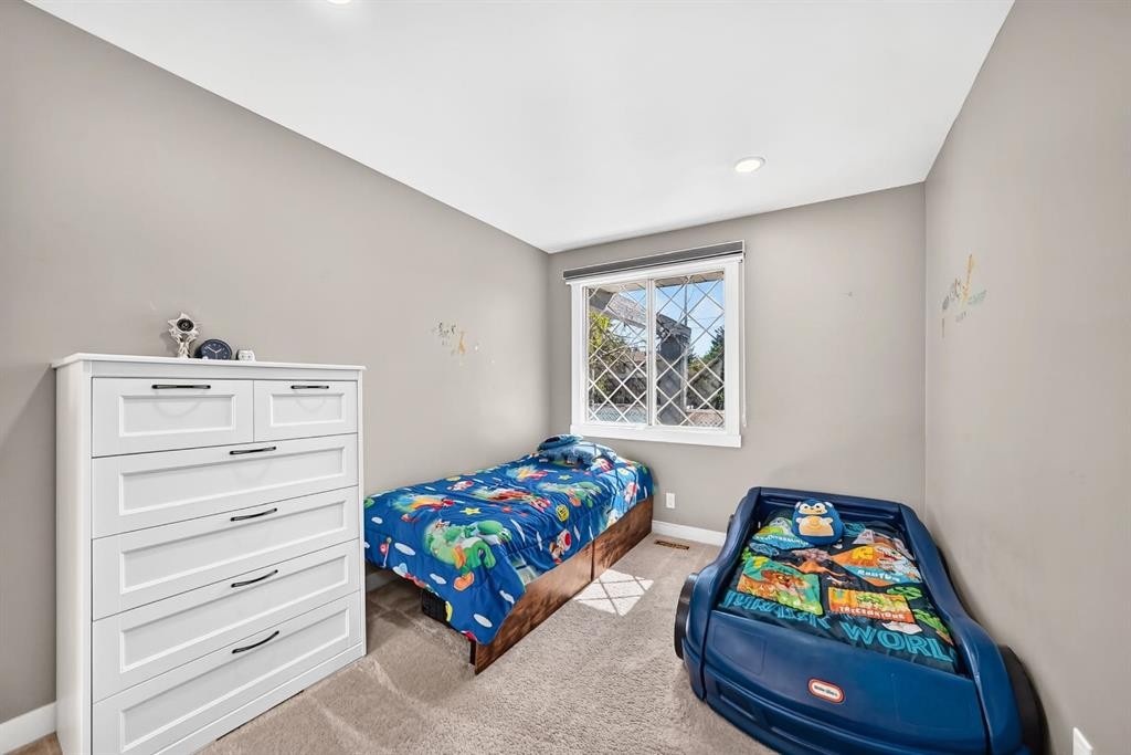 2203 65 Street Ne, Calgary, AB - Indoor Photo Showing Bedroom