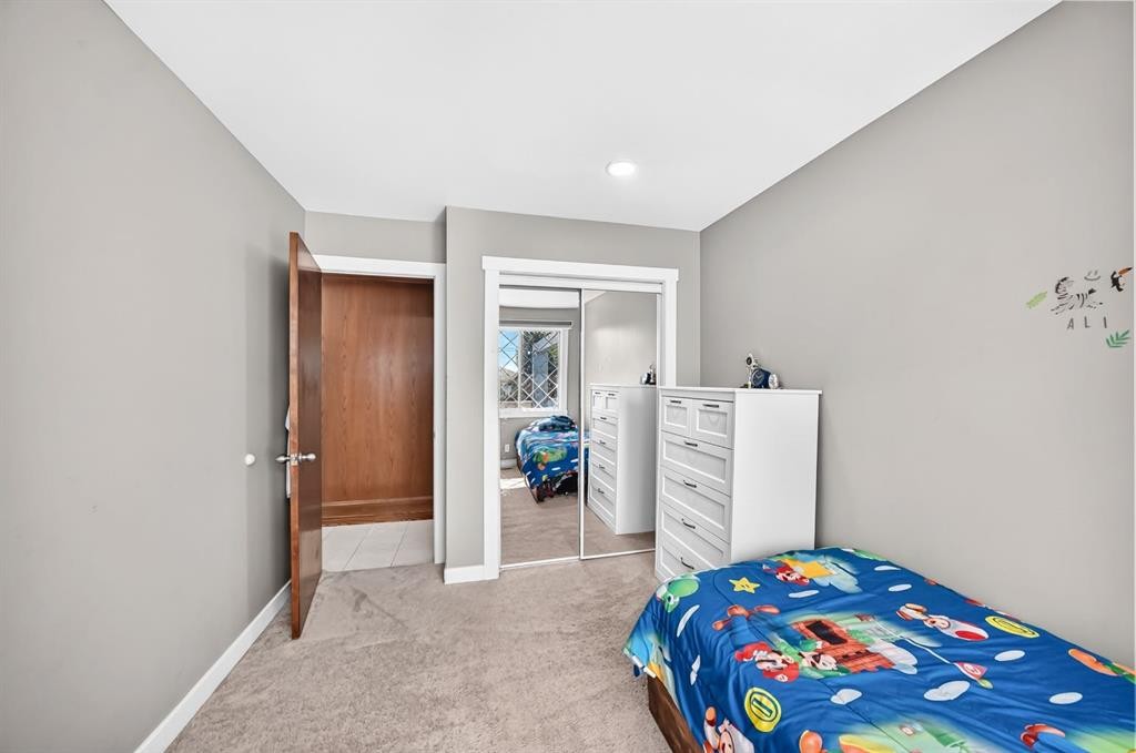 2203 65 Street Ne, Calgary, AB - Indoor Photo Showing Bedroom